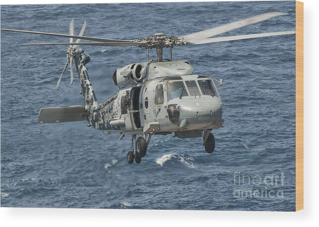 Arabian Sea Wood Print featuring the photograph A Us Navy Sh-60f Seahawk Flying by Giovanni Colla