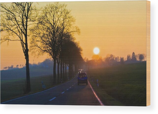 Sunset Wood Print featuring the photograph Catching the sun by Tatiana Travelways