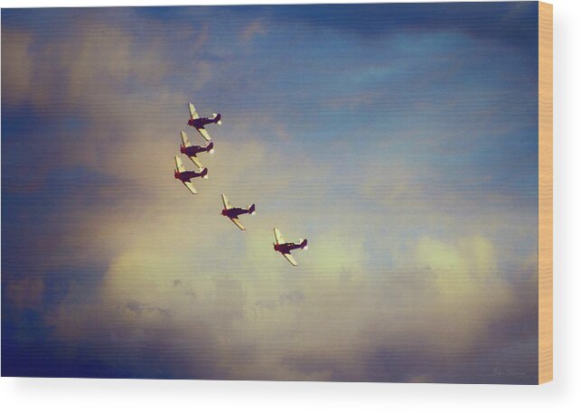 Airplanes Wood Print featuring the photograph Into The Wild Blue Yonder by John Rivera