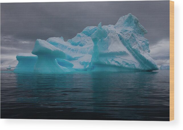 Melting Wood Print featuring the photograph Icebergs With Eroding And Changing Form #1 by Mint Images/ Art Wolfe