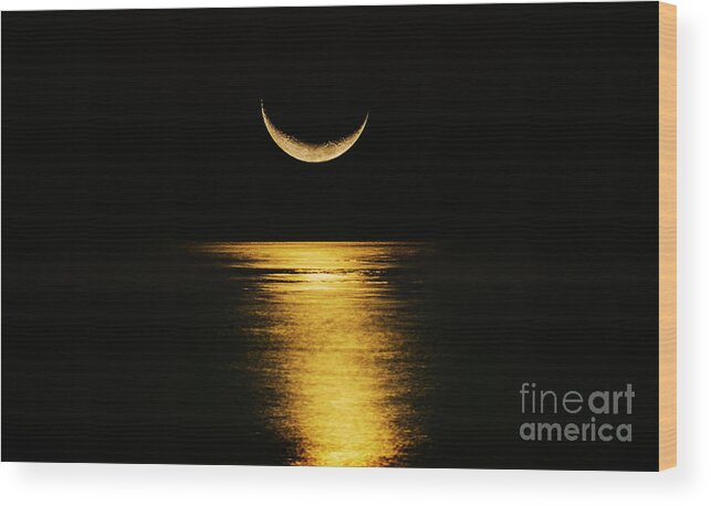 Black Color Wood Print featuring the photograph Crescent Moon Reflecting In Sea by Tetra Images