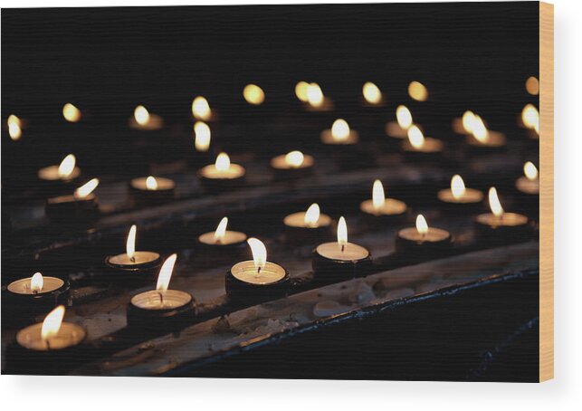 In A Row Wood Print featuring the photograph Rows Of Votive Candles In Church by Ldf