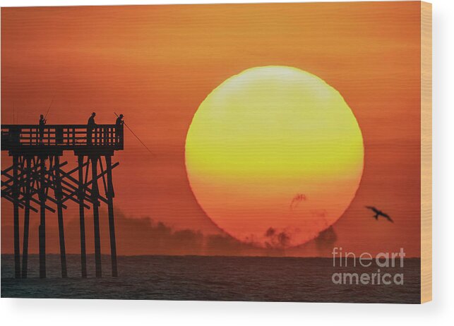 Sunrise Wood Print featuring the photograph Reeling in the Sun #1 by DJA Images
