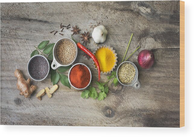 Southeast Asia Wood Print featuring the photograph Flat lay overhead view herb and spices on rustic wooden background. by Twomeows