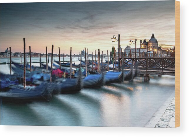 Gondola Wood Print featuring the photograph Venice Gondolas moored at the San Marco square. by Michalakis Ppalis