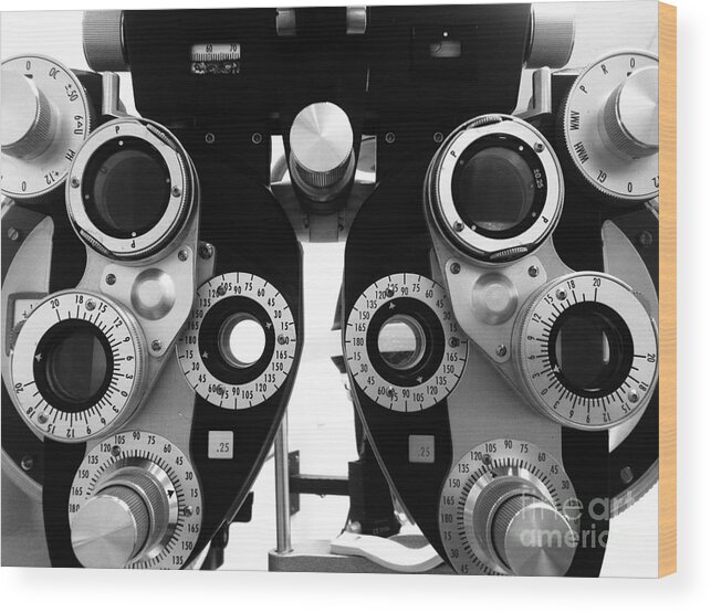 Black And White Wood Print featuring the photograph Closeup of a Phoropter Eye Examination Equipment #2 by Amy Cicconi