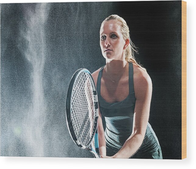 Tennis Wood Print featuring the photograph Caucasian Tennis Player Standing In Rain by Erik Isakson