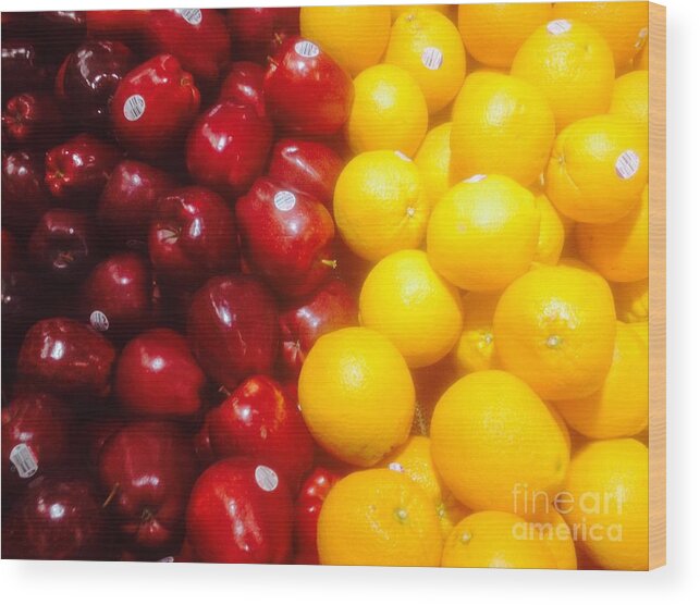 Apple Wood Print featuring the photograph I'm comparing apples and oranges by WaLdEmAr BoRrErO