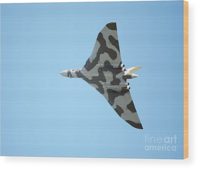 Vulcan Bomber Wood Print featuring the photograph Vulcan bomber in flight by Paul Cowan