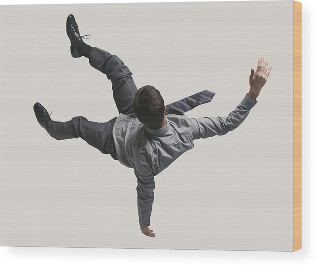 People Wood Print featuring the photograph Young businessman in the air, falling down by Klaus Vedfelt