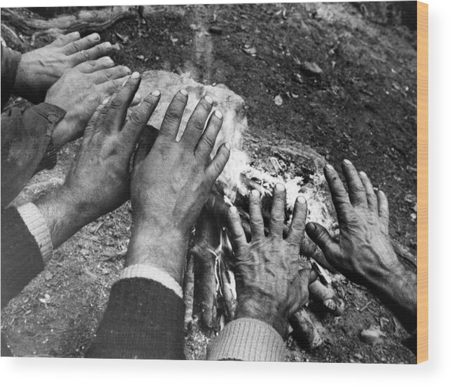  Concept Wood Print featuring the photograph Workers' hands by the fire by Emanuel Tanjala