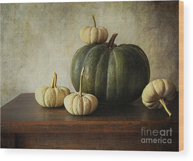 Agricultural Wood Print featuring the photograph Green pumpkin and gourds on table #2 by Sandra Cunningham