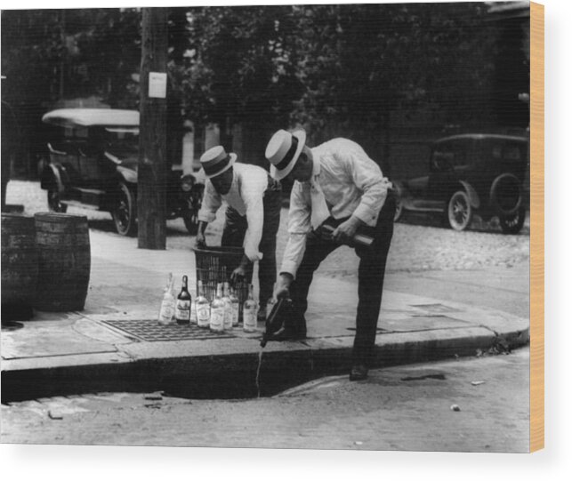 1920s Candid Wood Print featuring the photograph Prohibition, Pouring Whiskey by Everett