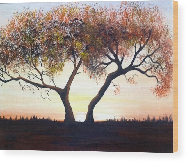 A One Hundred Year Old Tree In The Middle Of A Meadow. The Sun Is Coming Up In A Cloudless Sky With Distance Trees In The Background. The Tree Has Many Dead Branches And The Leaves Are Multiple-colored. Wood Print featuring the painting The Eli Tree by Martin Schmidt