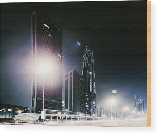 Arabia Wood Print featuring the photograph Dubai City Nightshot With Skyline #1 by Ppampicture