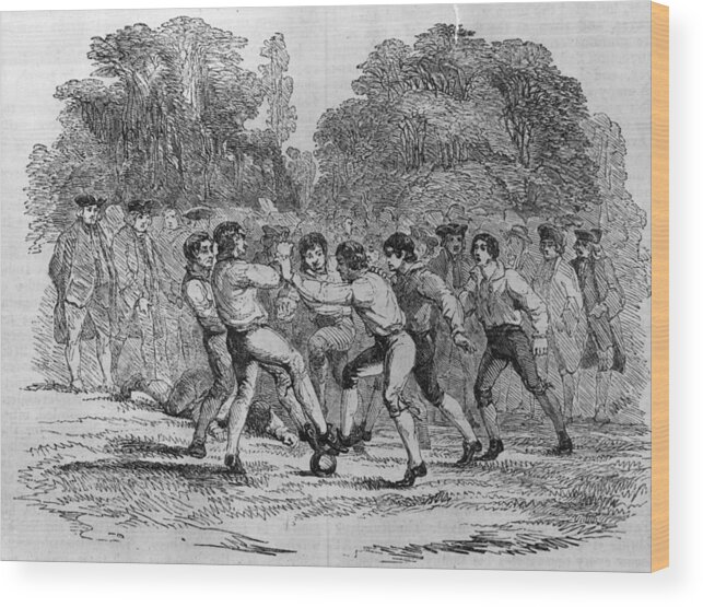 Recreational Pursuit Wood Print featuring the digital art 18th Century Soccer by Hulton Archive