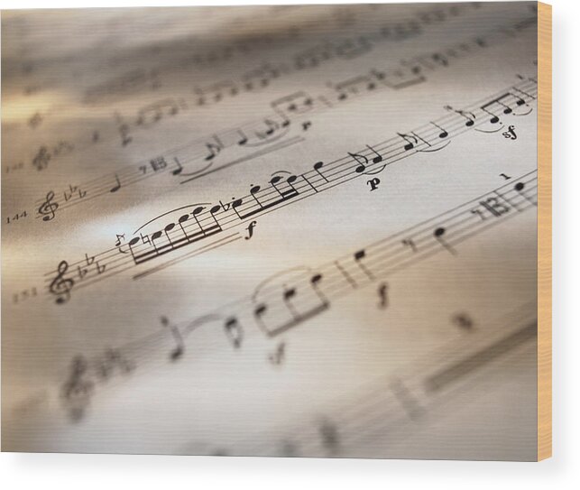 Sheet Music Wood Print featuring the photograph Detail Of Sheet Music #2 by Ryan Mcvay