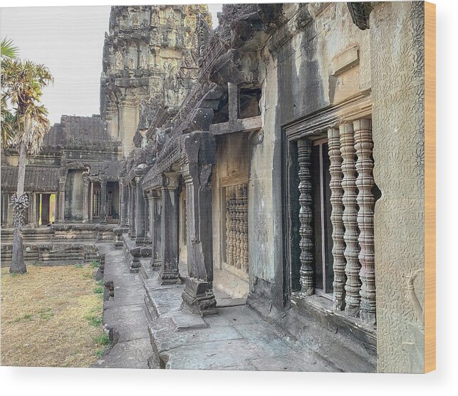 Ancient Wood Print featuring the photograph Entrance wall around Angkor Wat temple in Cambodia by Karen Foley