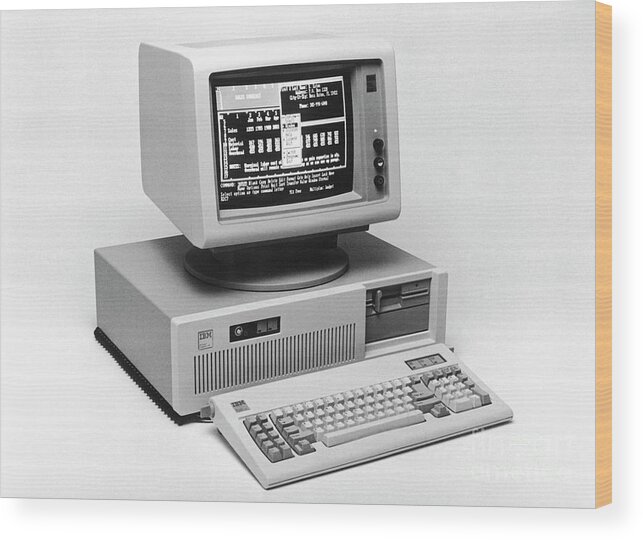 1980-1989 Wood Print featuring the photograph Ibm At Computer by Bettmann
