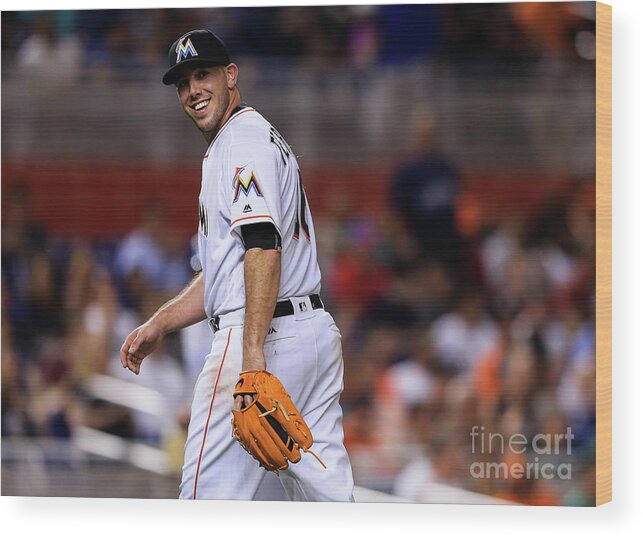 Looking Over Shoulder Wood Print featuring the photograph Kansas City Royals V Miami Marlins by Rob Foldy