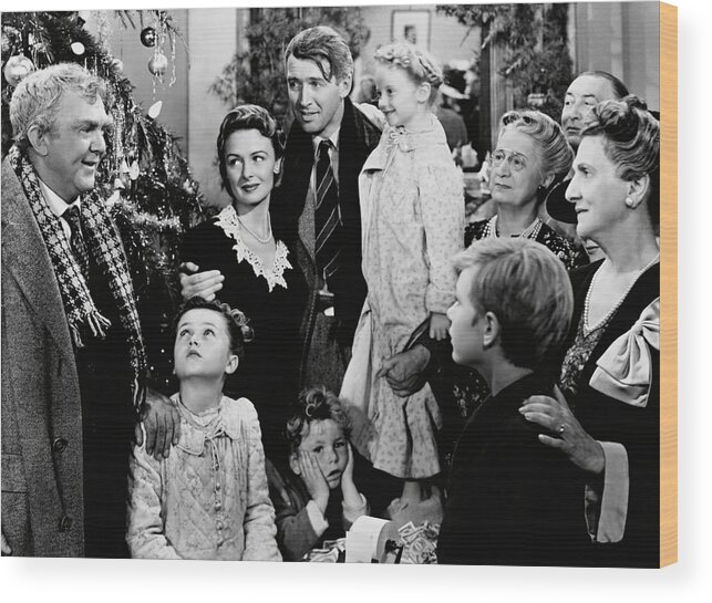 Beulah Bondi Wood Print featuring the photograph THOMAS MITCHELL , JAMES STEWART , DONNA REED and BEULAH BONDI in IT'S A WONDERFUL LIFE -1946-. by Album