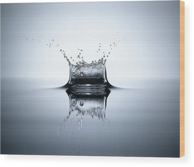 Tranquility Wood Print featuring the photograph Water Splash In A Pool Of Water by Chris Stein
