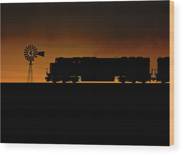 Train Wood Print featuring the photograph Wyoming Sunset With A Train by Tom Danneman