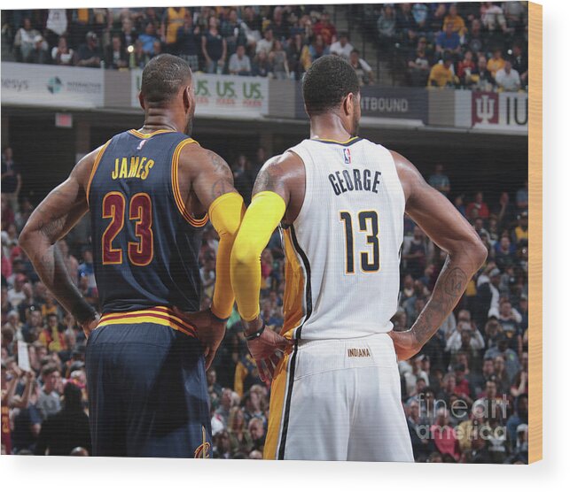 Lebron James Wood Print featuring the photograph Paul George and Lebron James #1 by Ron Hoskins