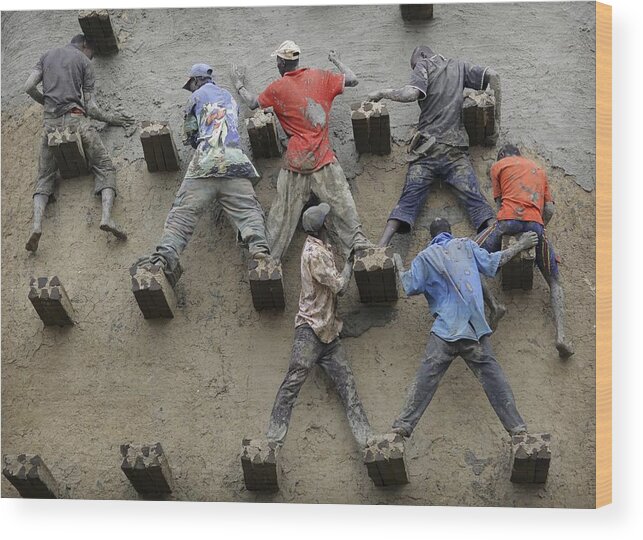 People Wood Print featuring the photograph Men replaster the great mud Mosque, Djenne, Mali #2 by Timothy Allen