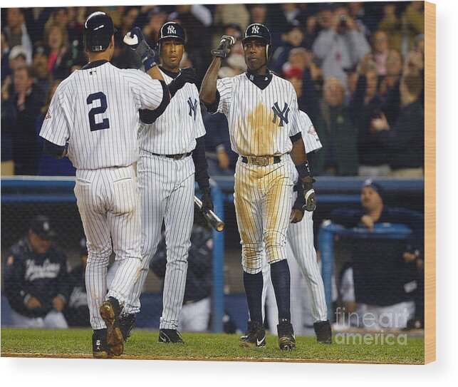 Alfonso Soriano Wood Print featuring the photograph Alfonso Soriano, Derek Jeter, and Bernie Williams by Al Bello
