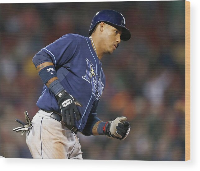 Game Two Wood Print featuring the photograph Yunel Escobar by Jim Rogash