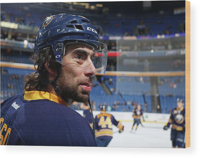 National Hockey League Wood Print featuring the photograph Calgary Flames V Buffalo Sabres #1 by Bill Wippert