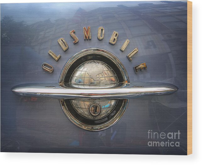 1952 Oldsmobile Logo Wood Print featuring the photograph 1952 Oldsmobile logo by Arttography LLC
