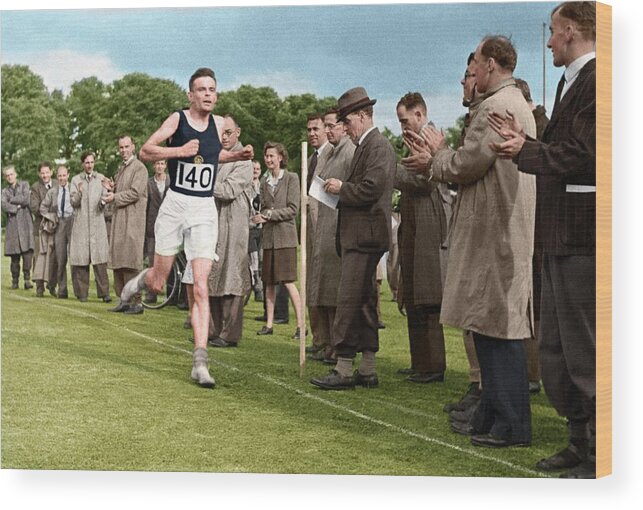 Alan Turing Wood Print featuring the photograph Alan Turing Finishing A Race by National Physical Laboratory Crown Copyright/science Photo Library. Coloured By Science Photo Library