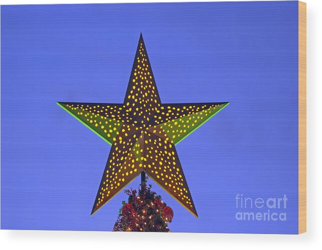 Christmas Wood Print featuring the photograph Christmas star during dusk time by George Atsametakis