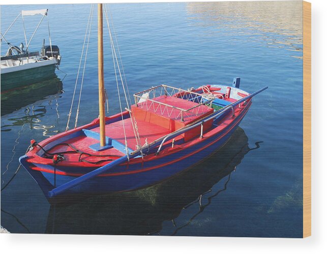 Boat In Clear Waters Wood Print featuring the photograph Clear Waters by George Katechis