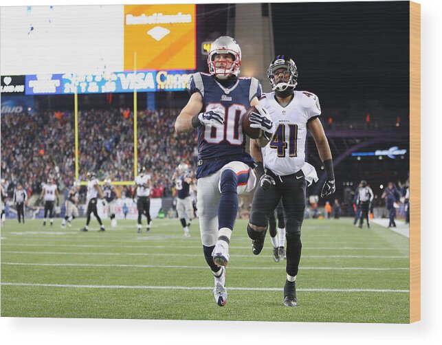 Playoffs Wood Print featuring the photograph Divisional Playoffs - Baltimore Ravens v New England Patriots by Jim Rogash