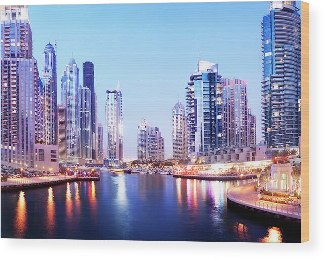 Built Structure Wood Print featuring the photograph Dubai Marina Skyline At Night In The by Deejpilot