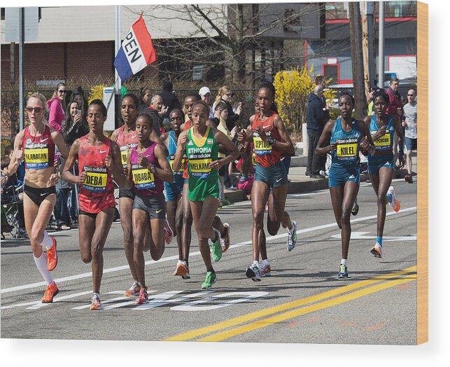 2014 Wood Print featuring the photograph Elite Women Runners at the Boston Marathon by John Hoey