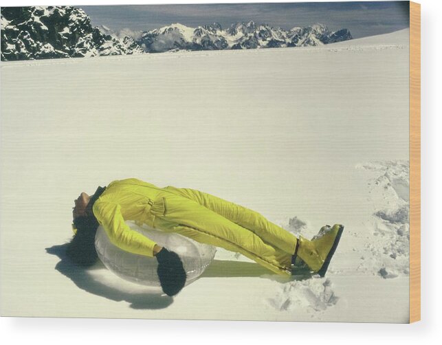 Fashion Wood Print featuring the photograph Model Wearing A Yellow Jump Suit by Arnaud de Rosnay