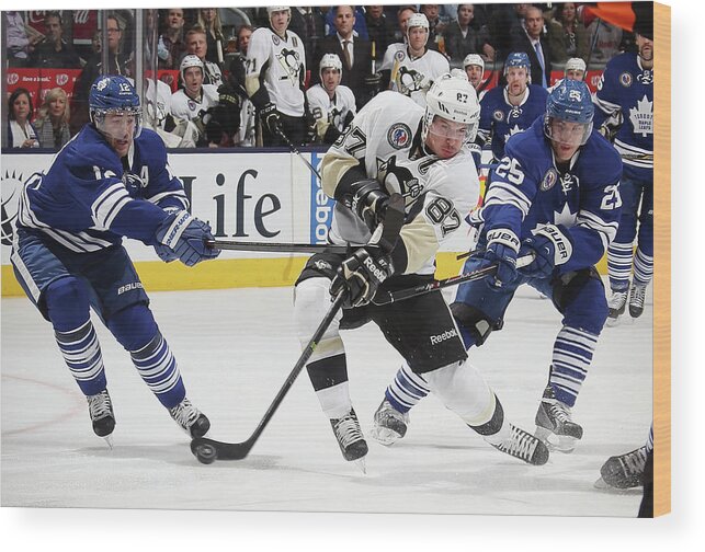 National Hockey League Wood Print featuring the photograph Pittsburgh Penguins V Toronto Maple by Bruce Bennett