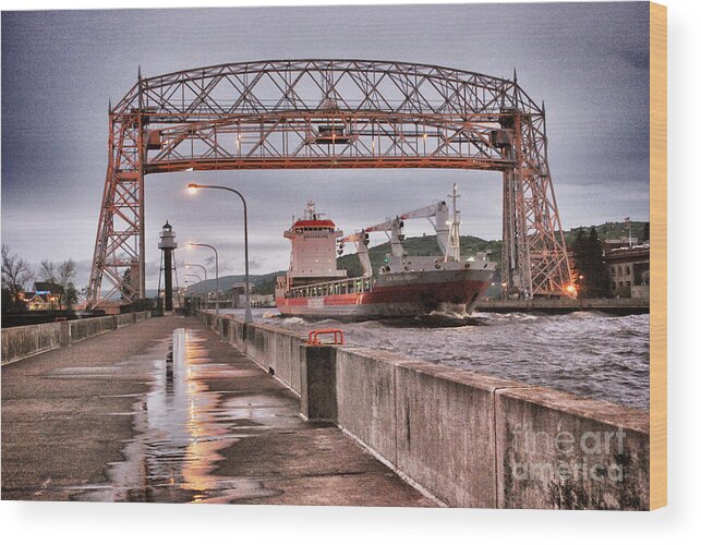 Aerial Lift Bridge Wood Print featuring the photograph Sailing Through The Duluth Aerial Lift Bridge by Ever-Curious Photography Aerial Lift Bridge Wood Print featuring the photograph Sailing Through The Duluth Aerial Lift Bridge by Ever-Curious Photography