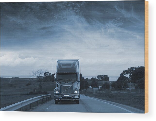Truck Wood Print featuring the photograph Trucking Late At Night by Christian Lagereek