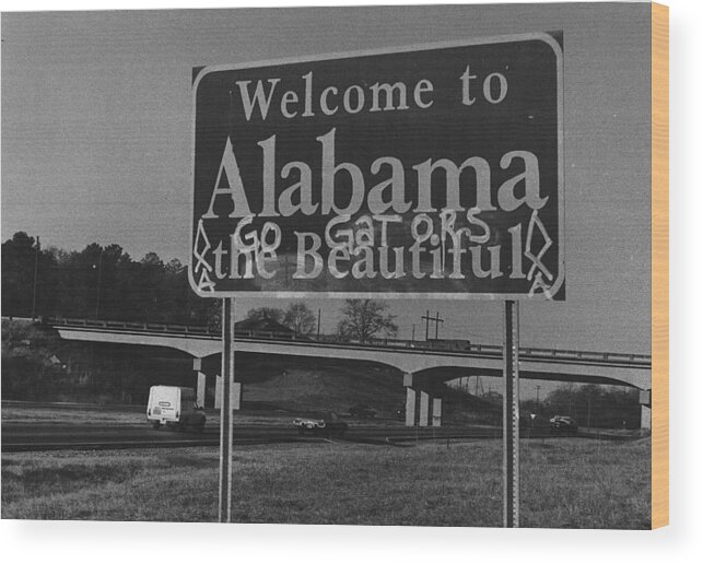 Signs Wood Print featuring the photograph Vintage Alabama Florida Football Sign by Retro Images Archive