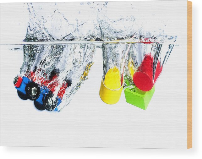 Toys Wood Print featuring the photograph Wooden toys in water by Mike Santis