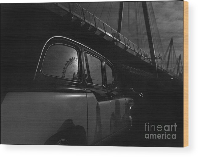 Hungerford Bridges Wood Print featuring the photograph Black Cab and Hungerford Bridge by Aldo Cervato