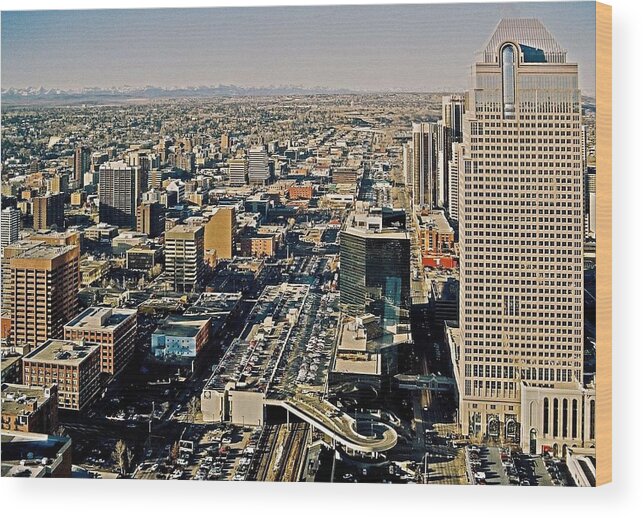 North Armerica Wood Print featuring the photograph Downtown Calgary with the Canadian Rockies ... by Juergen Weiss