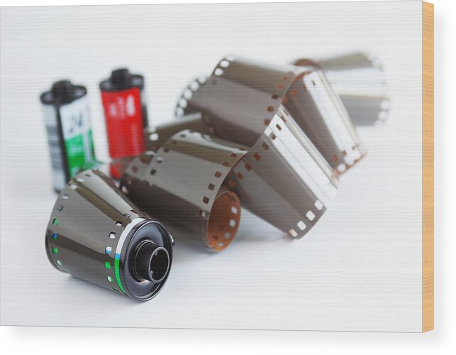 35mm Wood Print featuring the photograph Film and Canisters by Carlos Caetano