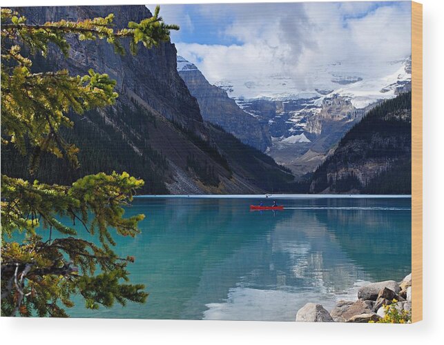Lake Louise Wood Print featuring the photograph Canoe on Lake Louise by Larry Ricker