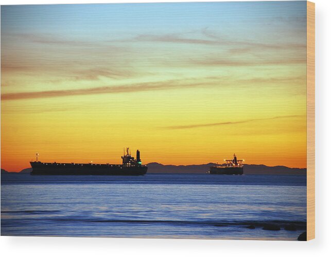 Cargo Wood Print featuring the photograph Cargo Ships at Sunset by Alasdair Turner